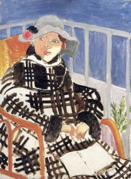 Mlle Matisse in een Schotse geruite jas