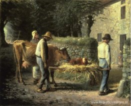 Boeren brengen een op het veld geboren kalf mee naar huis