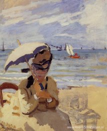 Camille zittend op het strand van Trouville