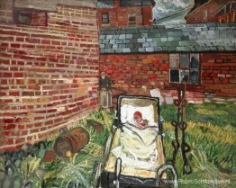 Baby in een kinderwagen in een tuin